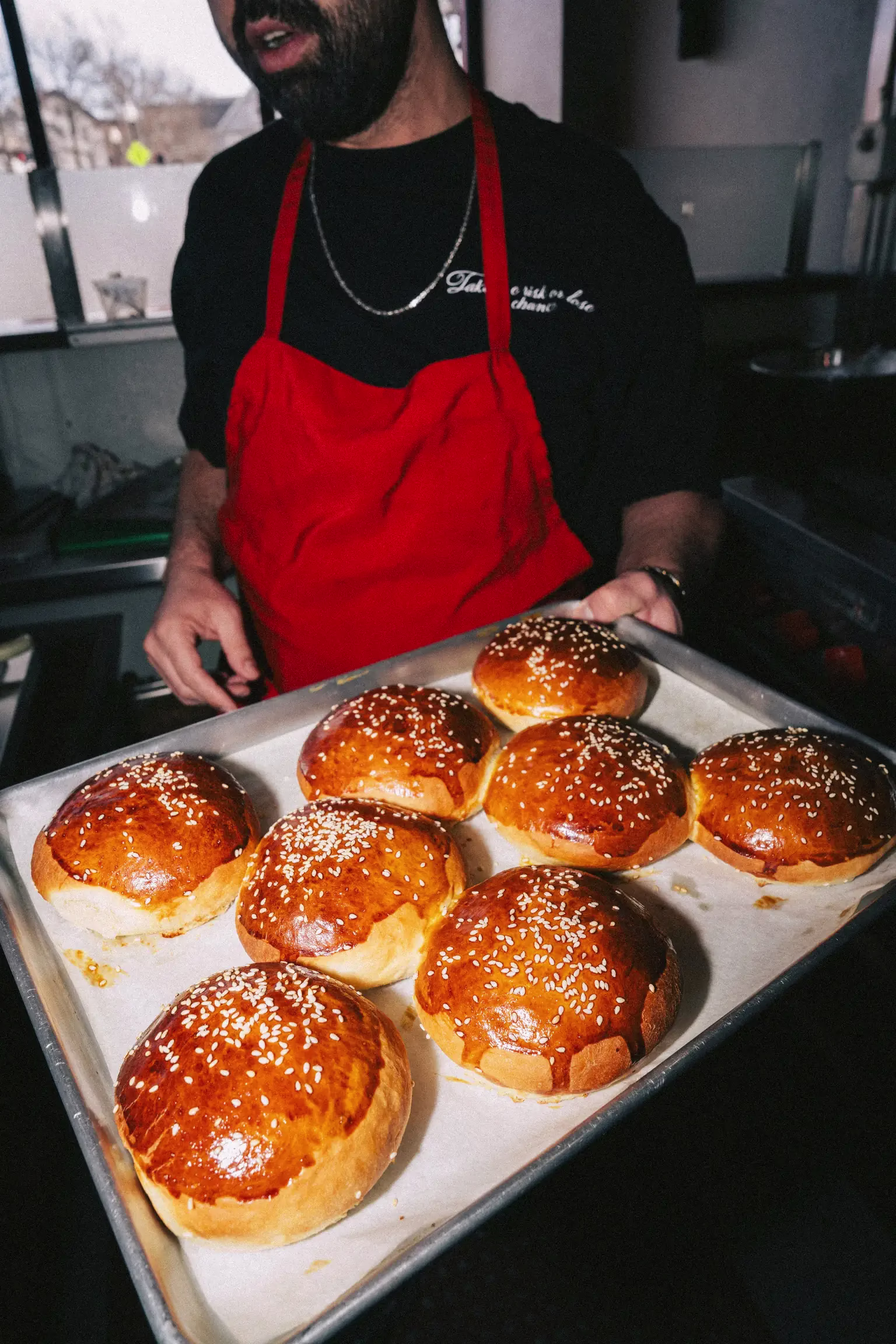 Fresh baked burger buns on trays at FRIES B4 GUYS in Allston, Boston